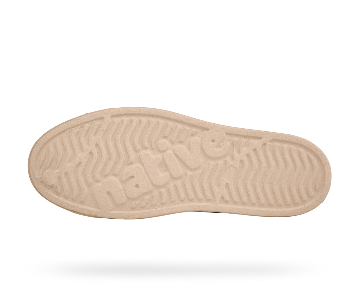 Bottom view of a Native Shoes Jefferson Bloom | Bone White / Soy Beige / Shell Speckle Footwear in Bone White / Soy Beige / Shell Speckle