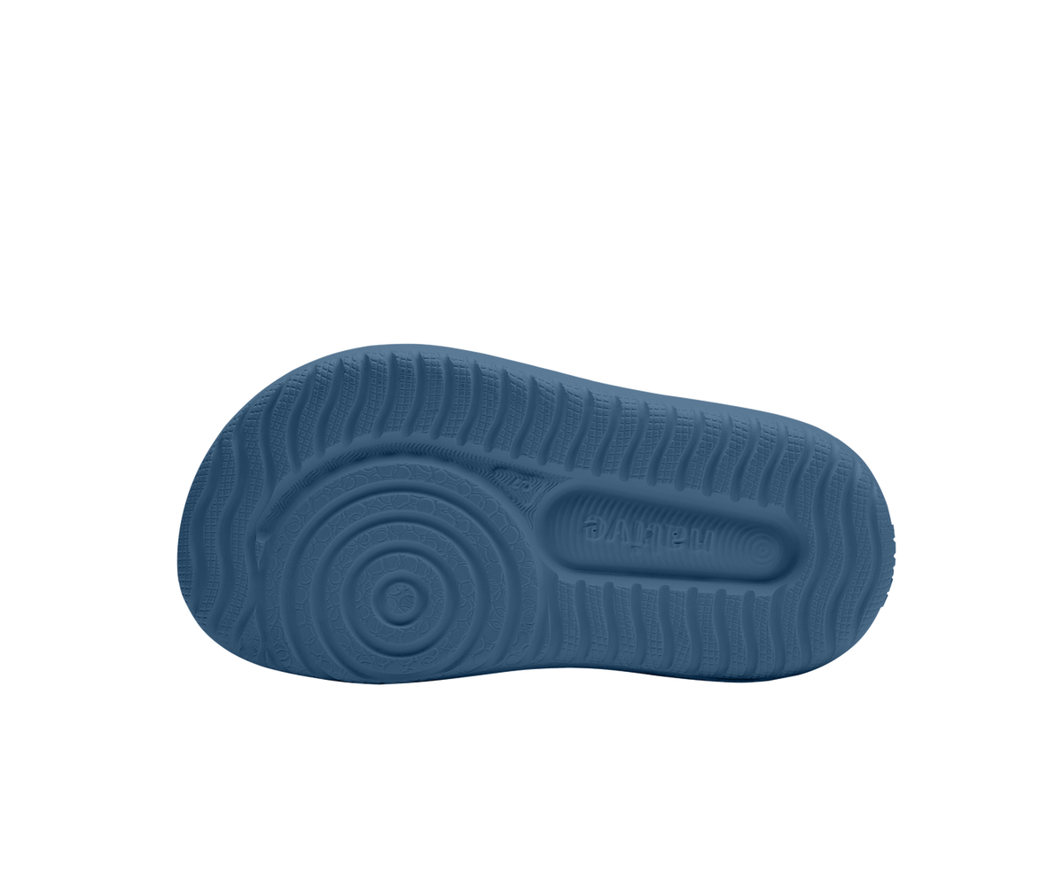 Bottom view of a Native Shoes Kids Chase Kids | Oasis Blue / Oasis Blue Footwear in Oasis Blue / Oasis Blue