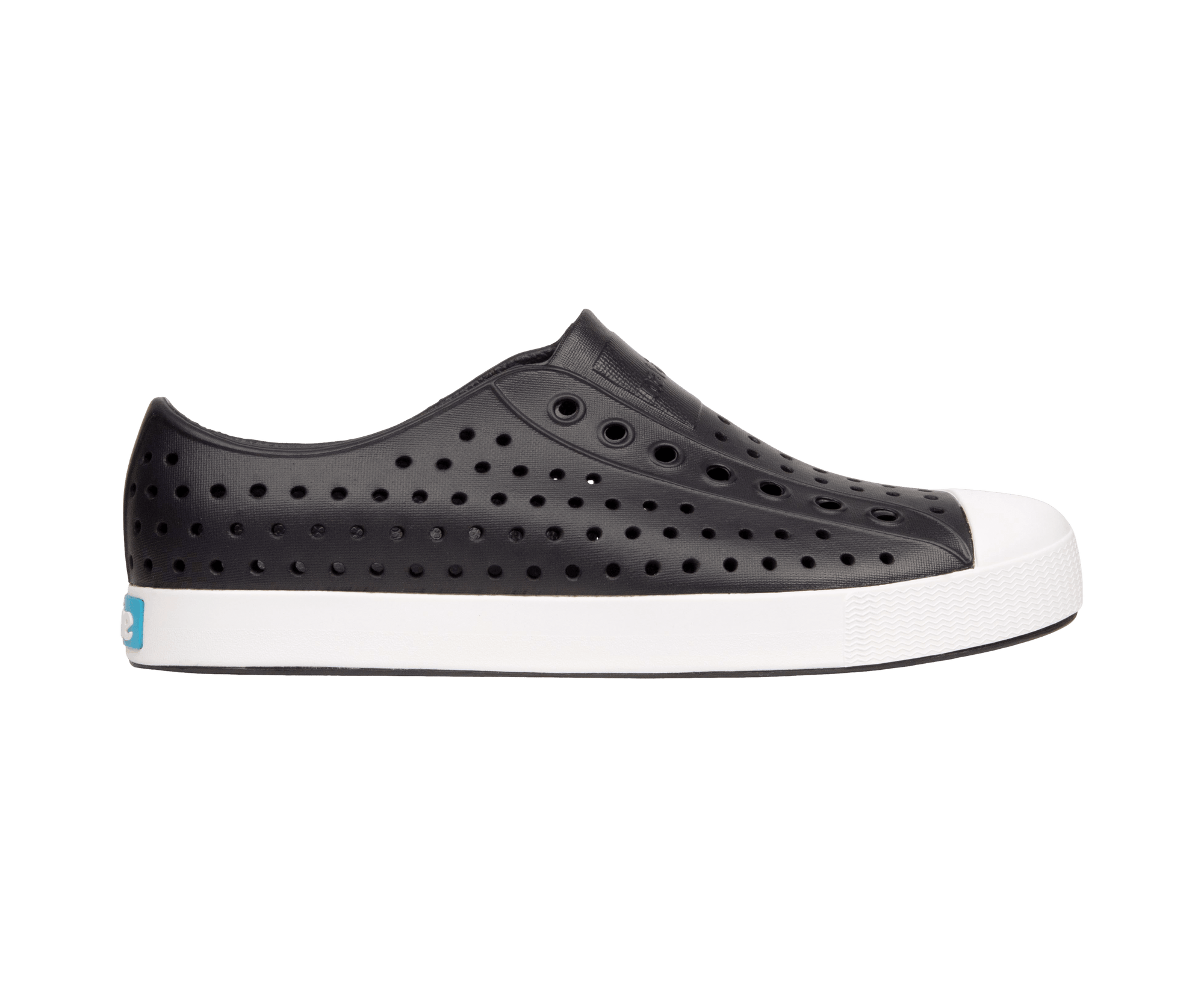 Side view of a Native Shoes Adults Jefferson Footwear in Jiffy Black / Shell White