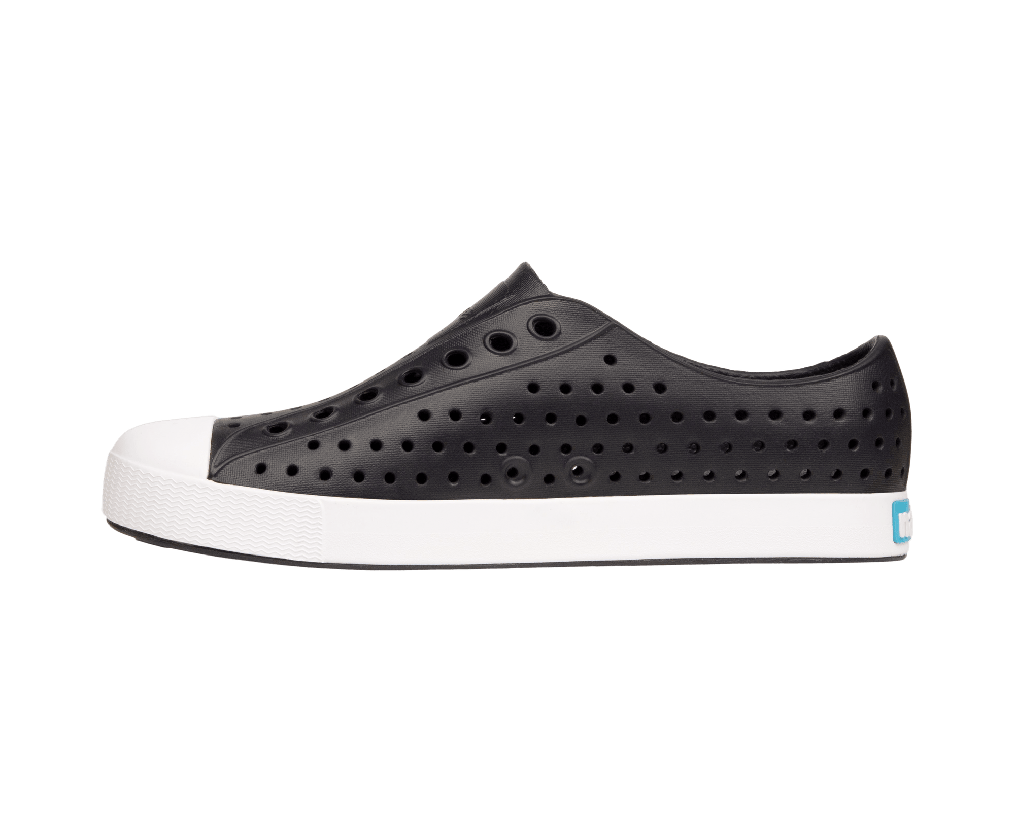 Angled view of a Native Shoes Jefferson | Jiffy Black / Shell White Footwear in Jiffy Black / Shell White