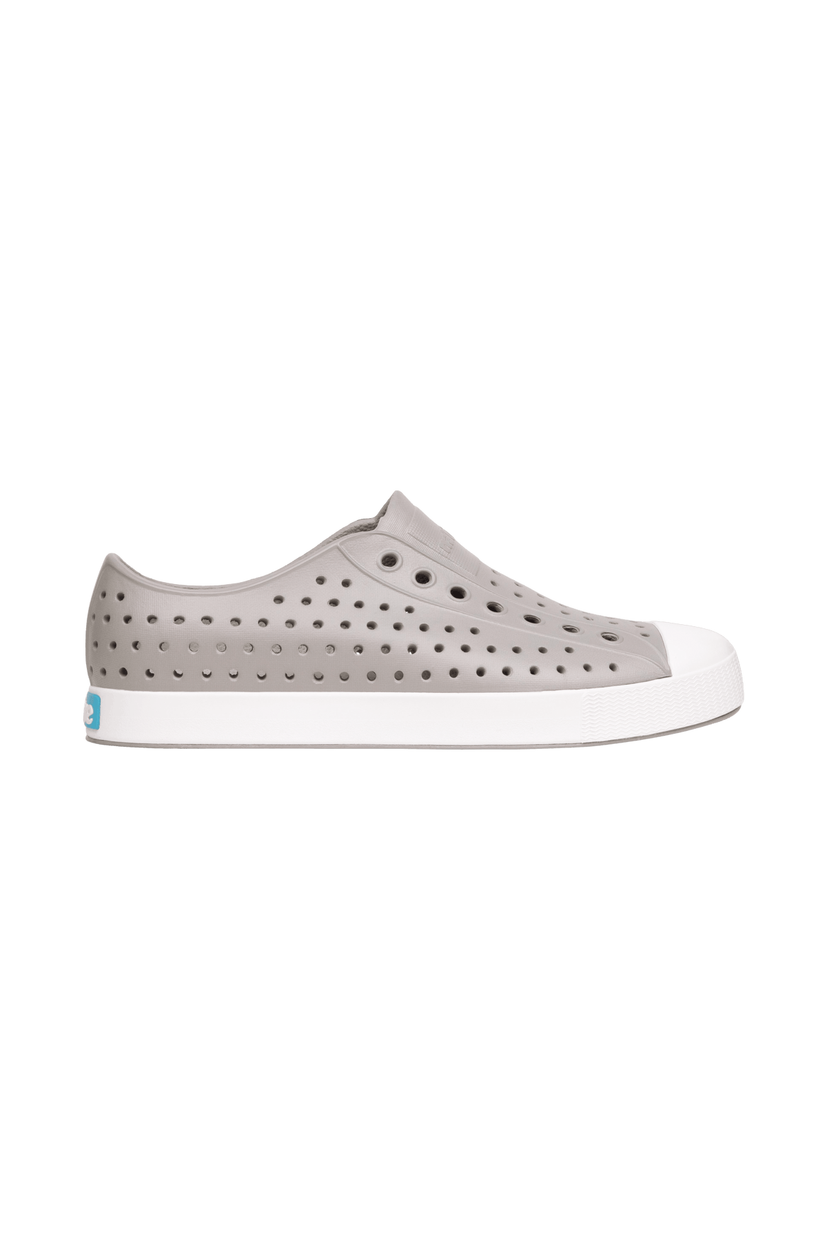 Side view of a Native Shoes Adults Jefferson Footwear in Pigeon Grey / Shell White