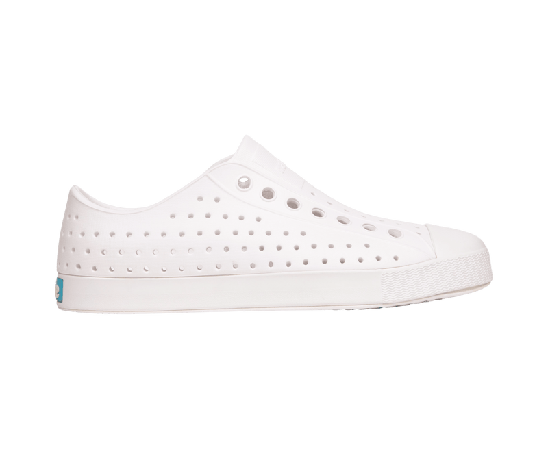 Side view of a Native Shoes Adults Jefferson Footwear in Shell White / Shell White