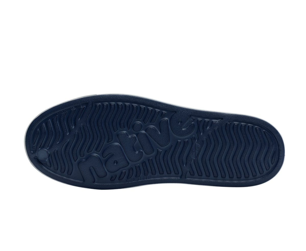 Bottom view of a Native Shoes Jefferson | Regatta Blue / Shell White Footwear in Regatta Blue / Shell White