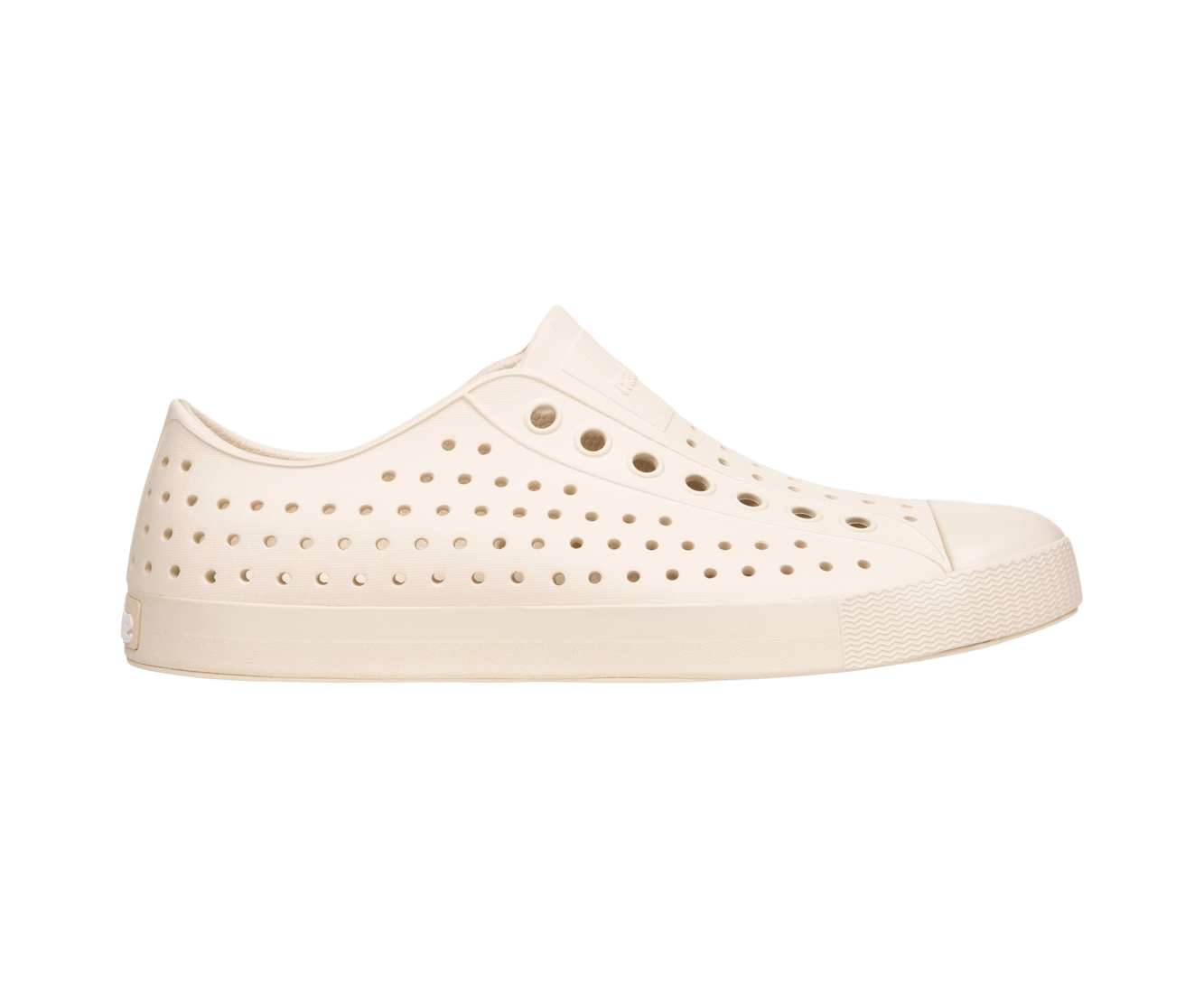 Side view of a Native Shoes Adults Jefferson Footwear in Bone White / Bone White
