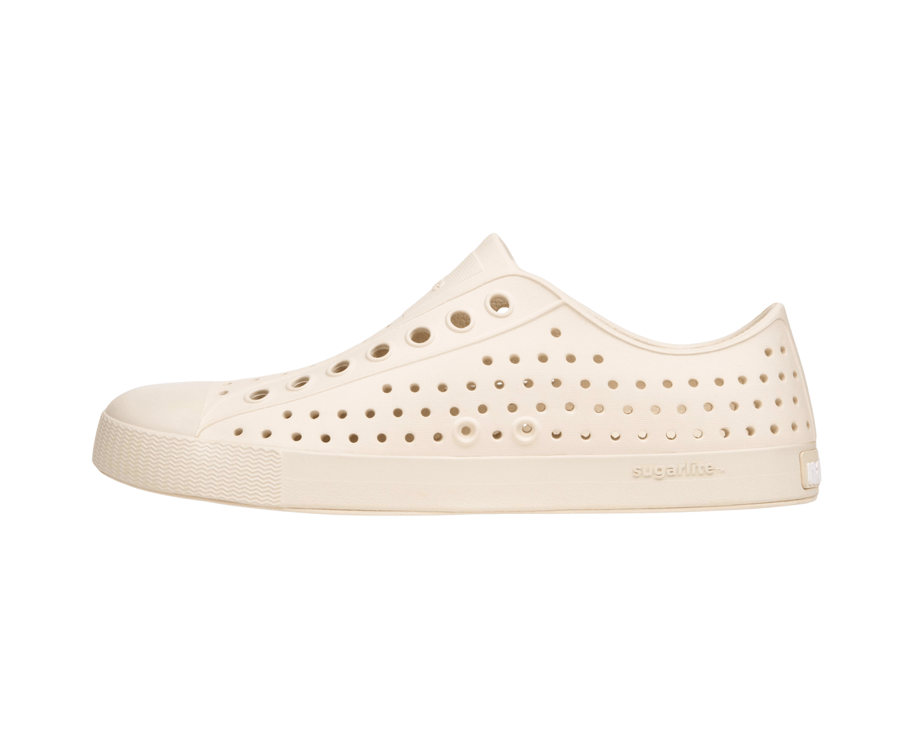 Angled view of a Native Shoes Jefferson | Bone White / Bone White Footwear in Bone White / Bone White