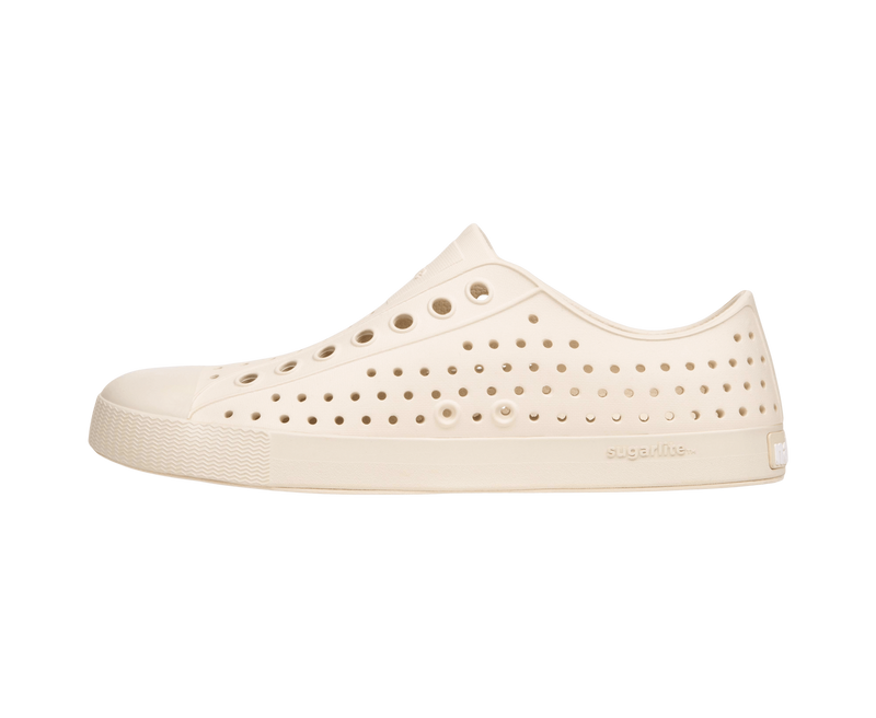 Angled view of a Native Shoes Jefferson | Bone White / Bone White Footwear in Bone White / Bone White
