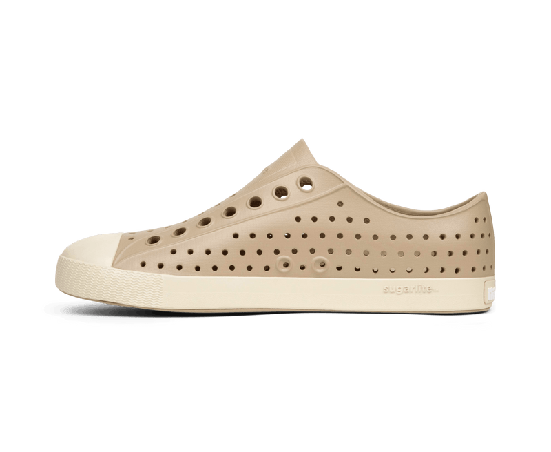 Angled view of a Native Shoes Jefferson | Flax Tan / Bone White Footwear in Flax Tan / Bone White