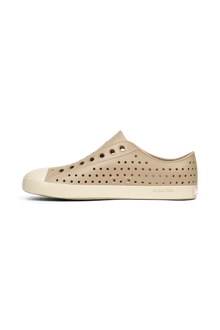 Angled view of a Native Shoes Jefferson | Flax Tan / Bone White Footwear in Flax Tan / Bone White