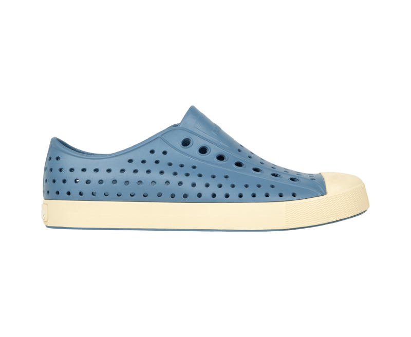 Side view of a Native Shoes Adults Jefferson Footwear in Oasis Blue / Bone White