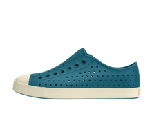 Side view of a Native Shoes Adults Jefferson Footwear in Faded Glory Blue / Bone White