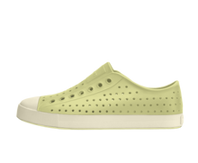 Side view of a Native Shoes Adults Jefferson Footwear in Vanilla Yellow / Bone White