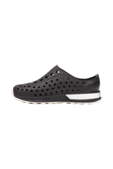 Angled view of a Native Shoes Kids Robbie Block Kids | Jfyblk/Jfyblk/Shlwht/Shlspckrb Footwear in Jfyblk/Jfyblk/Shlwht/Shlspckrb