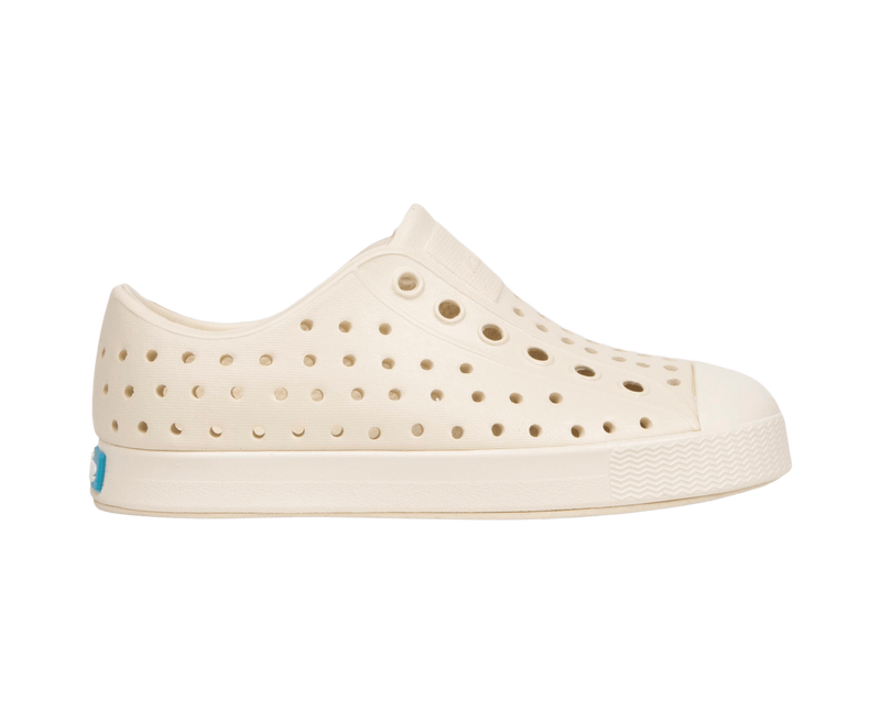 Side view of a Native Shoes Kids Jefferson Kids Footwear in Bone White / Bone White