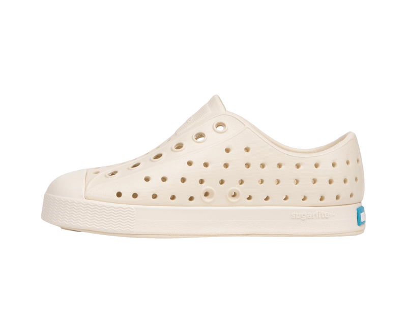 Angled view of a Native Shoes Kids Jefferson Kids | Bone White / Bone White Footwear in Bone White / Bone White