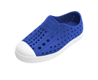 Angled view of a Native Shoes Kids Jefferson Kids | Uv Blue / Shell White Footwear in Uv Blue / Shell White