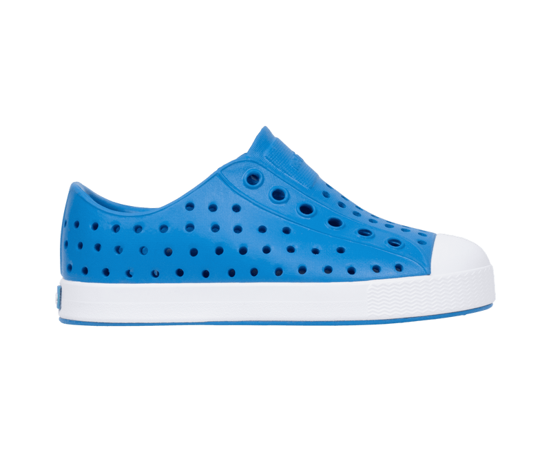 Side view of a Native Shoes Kids Jefferson Kids Footwear in Wave Blue / Shell White