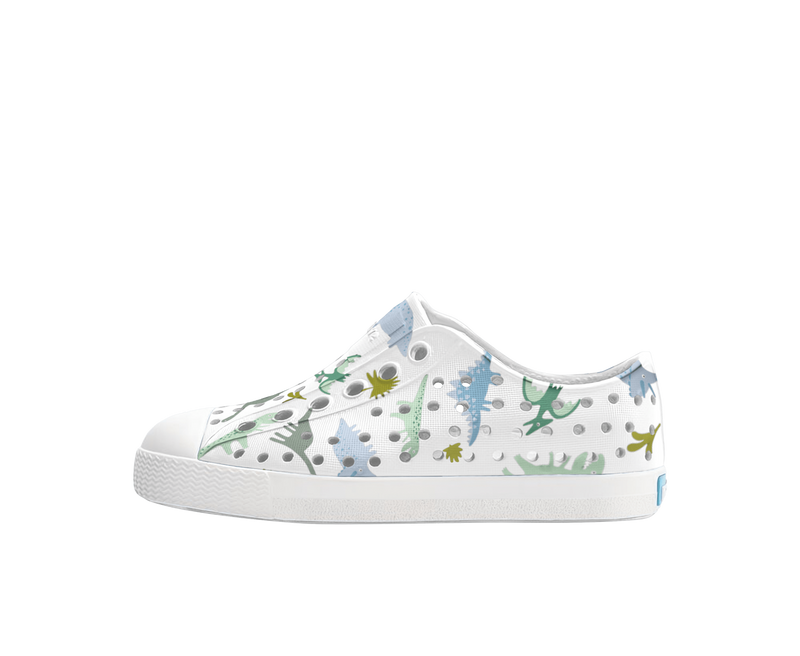 Side view of a Native Shoes Kids Jefferson Print Kids Footwear in Shell White / Shell White / Flux Alpine Dino