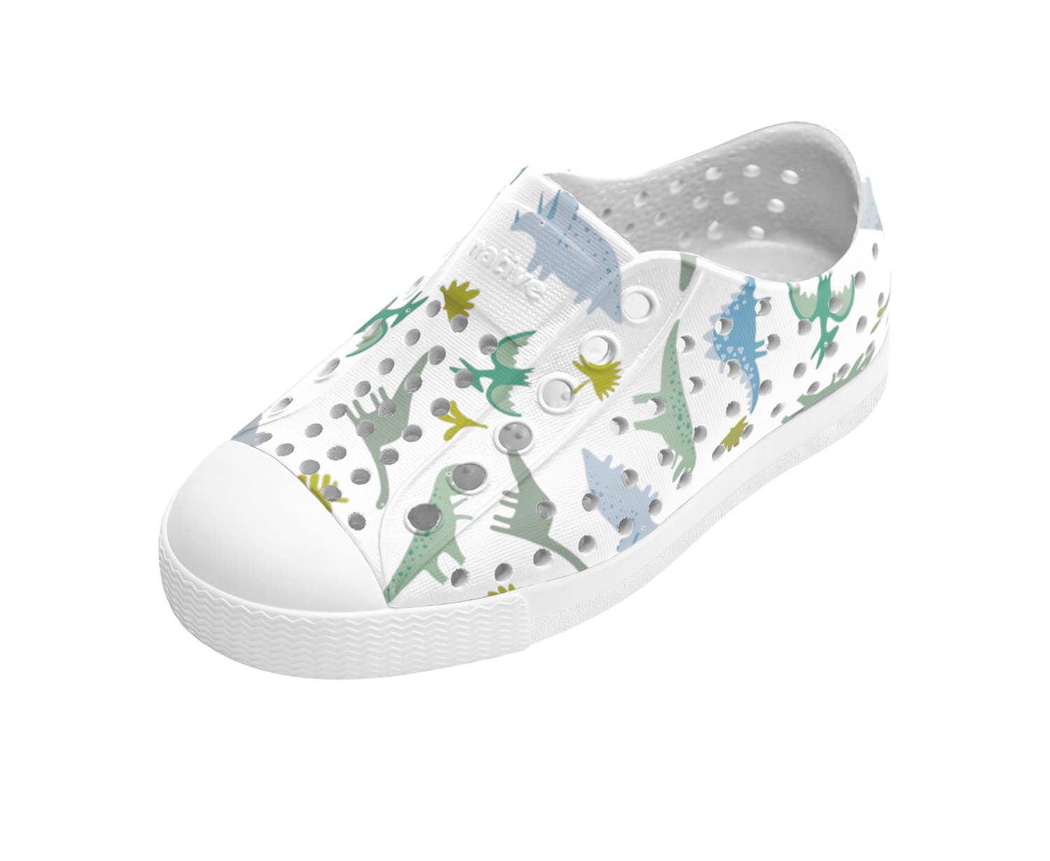 Angled view of a Native Shoes Kids Jefferson Print Kids | Shell White / Shell White / Flux Alpine Dino Footwear in Shell White / Shell White / Flux Alpine Dino