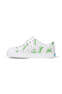 Bottom view of a Native Shoes Kids Jefferson Print Kids | Shell White / Shell White / Alligators Footwear in Shell White / Shell White / Alligators