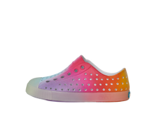 Side view of a Native Shoes Kids Jefferson Print Kids Footwear in Shell White / Transparent / Rainbow Spray