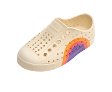 Angled view of a Native Shoes Kids Jefferson Block Kids | Bone White / Bone White / Apricot Dazzle Ultra Circle Footwear in Bone White / Bone White / Apricot Dazzle Ultra Circle
