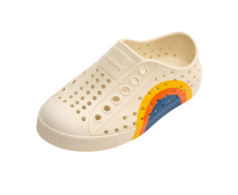 Angled view of a Native Shoes Kids Jefferson Block Kids | Bone White / Bone White / Spicy Laflame Vallarta Circle Footwear in Bone White / Bone White / Spicy Laflame Vallarta Circle