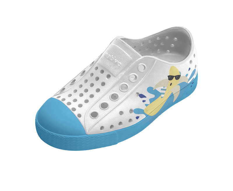 Angled view of a Native Shoes Kids Jefferson Block Kids | Shell White / Aquarius Blue / Banana Block Footwear in Shell White / Aquarius Blue / Banana Block