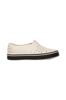 Side view of a Native Shoes Kids Miles Kids Footwear in Bnwht/Jfyblk