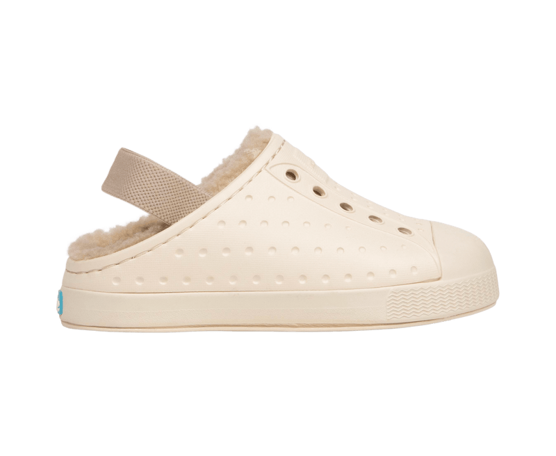 Side view of a Native Shoes Kids Jefferson Cozy Kids Footwear in Bone White / Bone White / Flax Tan