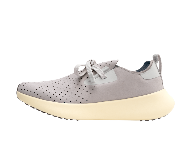 Side view of a Native Shoes Adults Apollo 10 Footwear in Ghost Grey / Tapioca Off White
