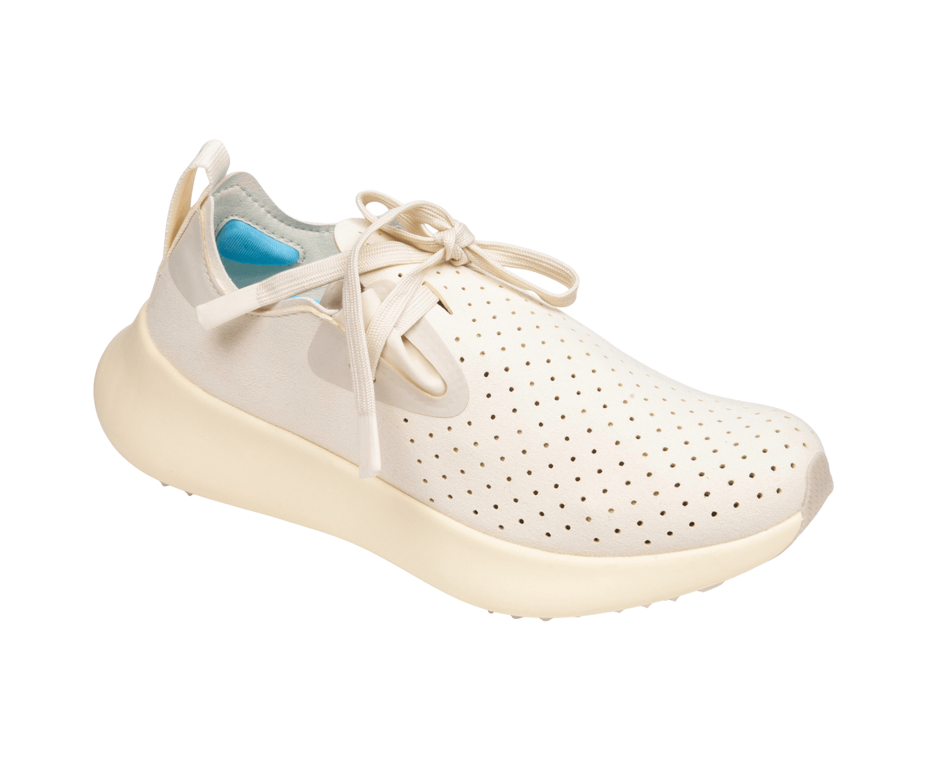 Angled view of a Native Shoes Apollo 10 | Bone White / Tapioca Off White Footwear in Bone White / Tapioca Off White