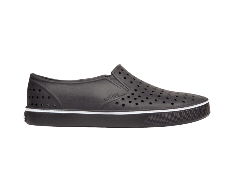 Side view of a Native Shoes Adults Miles Wanderfoam Footwear in Jiffy Black / Jiffy Black