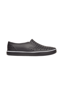 Side view of a Native Shoes Adults Miles Wanderfoam Footwear in Jiffy Black / Jiffy Black