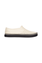 Side view of a Native Shoes Adults Miles Wanderfoam Footwear in Bnwht/Jfyblk