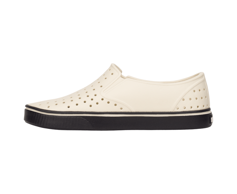 Angled view of a Native Shoes Miles Wanderfoam | Bnwht/Jfyblk Footwear in Bnwht/Jfyblk