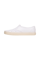 Angled view of a Native Shoes Miles Wanderfoam | Shell White / Bone White Footwear in Shell White / Bone White