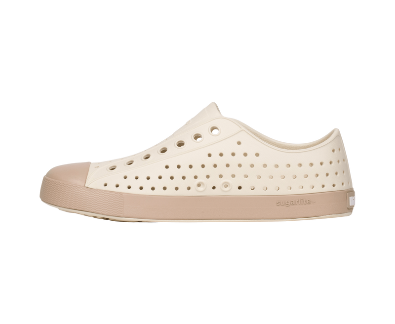 Angled view of a Native Shoes Jefferson Wanderfoam Block | Bnwht/Flxtn/Campvanbloc Footwear in Bnwht/Flxtn/Campvanbloc