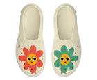 Side view of a Native Shoes Kids Miles Block Kids Footwear in Bone White / Shell White / Happy Flower Block