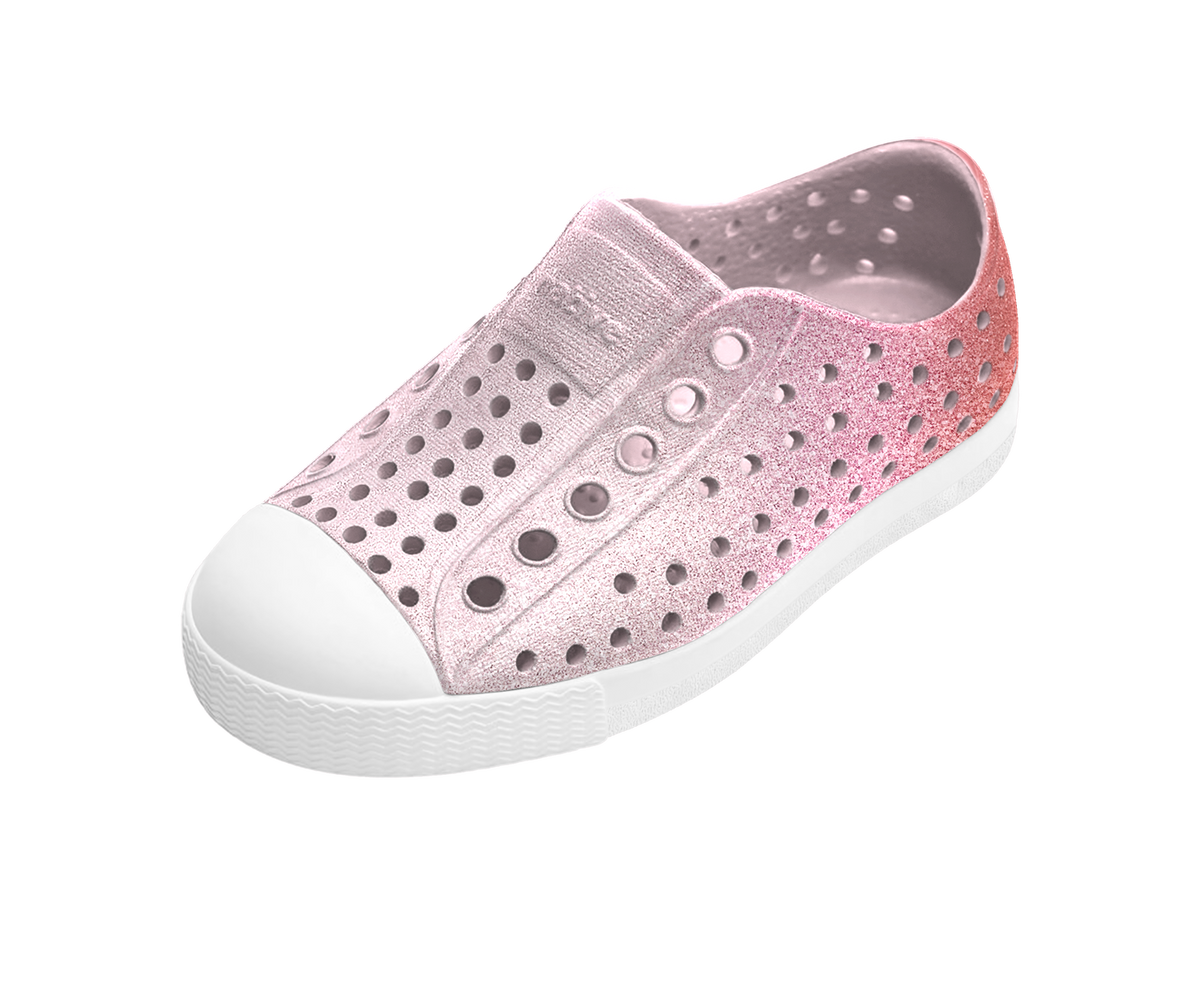 Angled view of a Native Shoes Kids Jefferson Bio-Bling Kids | Barely Samba Bling / Shell White Footwear in Barely Samba Bling / Shell White