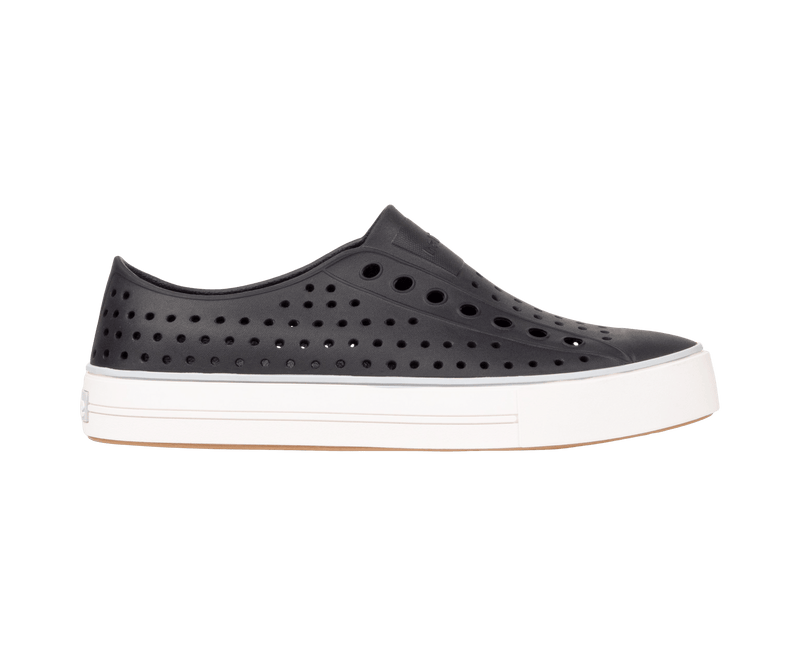 Side view of a Native Shoes Adults Jefferson Arc Wanderfoam Footwear in Jiffy Black / Whisper White