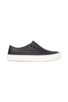 Side view of a Native Shoes Adults Jefferson Arc Wanderfoam Footwear in Jiffy Black / Whisper White