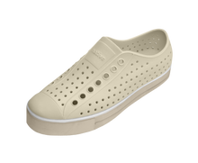 Angled view of a Native Shoes Jefferson Arc Wanderfoam | Bone White / Fog Beige Footwear in Bone White / Fog Beige