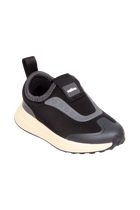Bottom view of a Native Shoes Kids Robbie Dash Kids | Jiffy Black / Tapioca Off White / Jiffy Black Footwear in Jiffy Black / Tapioca Off White / Jiffy Black