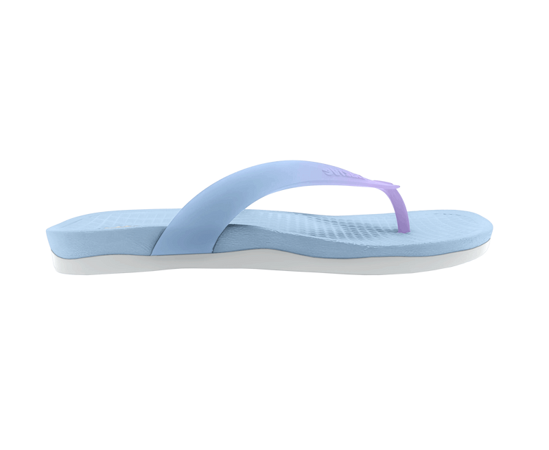 Side view of a Native Shoes Adults Paolo Wanderfoam Ombre Footwear in Skyway Blue / Dawn Blue / Twirling Ombre