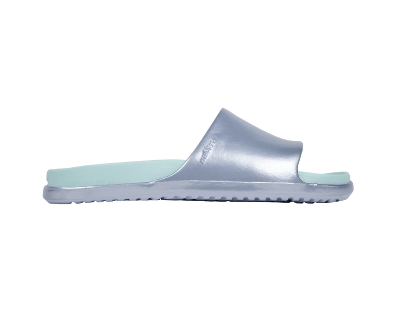 Side view of a Native Shoes Adults Spencer Lx Wanderfoam Metallic Footwear in Skyway Blue Metallic / Harbor Blue