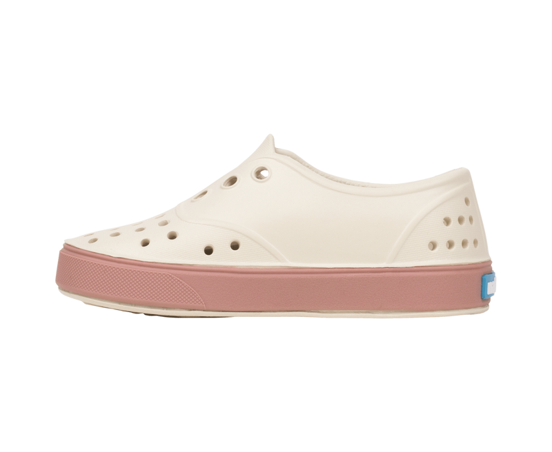 Angled view of a Native Shoes Kids Miller Kids | Bnwht/Caypnk Footwear in Bnwht/Caypnk